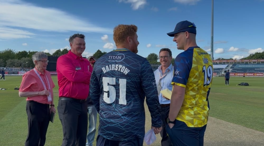 The captains at the toss