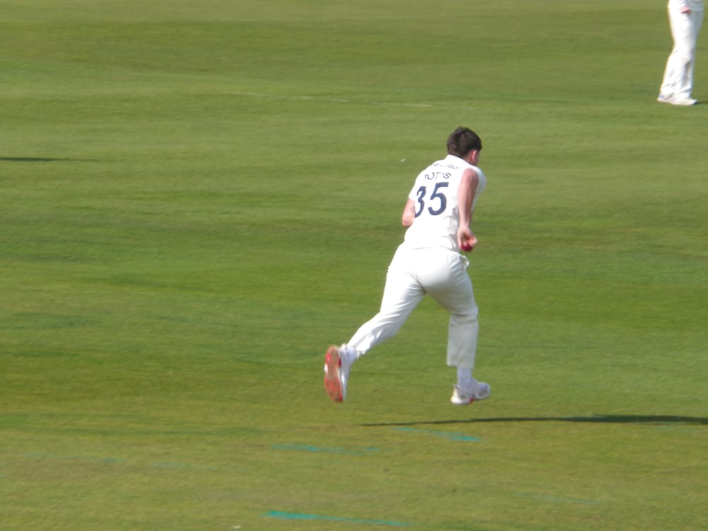 Matthew Potts bowling for Durham in the County Championship