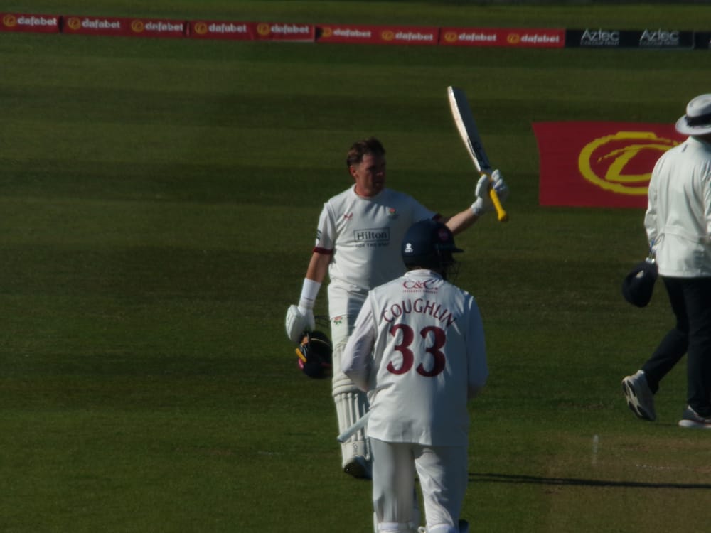 Lancashire's Marcus Harris celebrating his century against Durham in the Rothesay County Championship