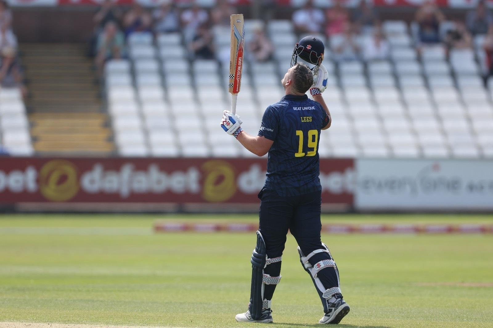 Alex Lees raising his bat in the air as he celebrates his unbeaten century against Middlesex in the One Day Cup.