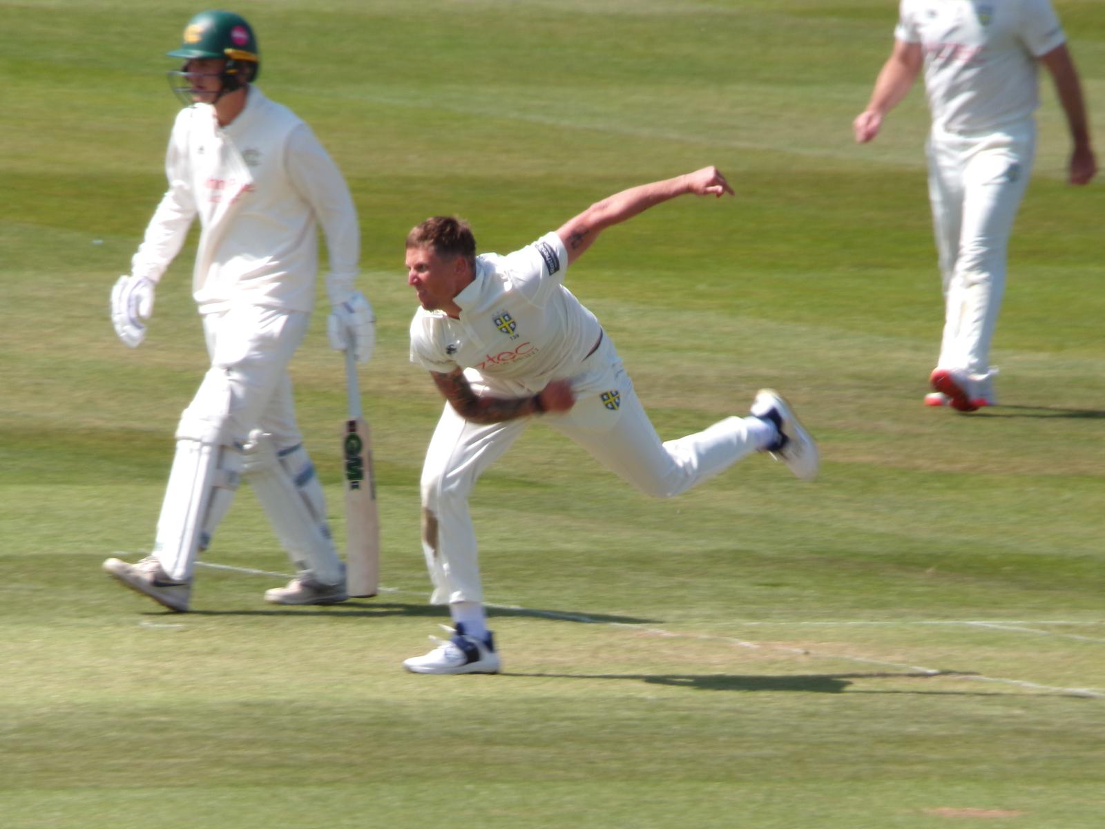 Brydon Carse bowling for Durham during the County Championship this season.
