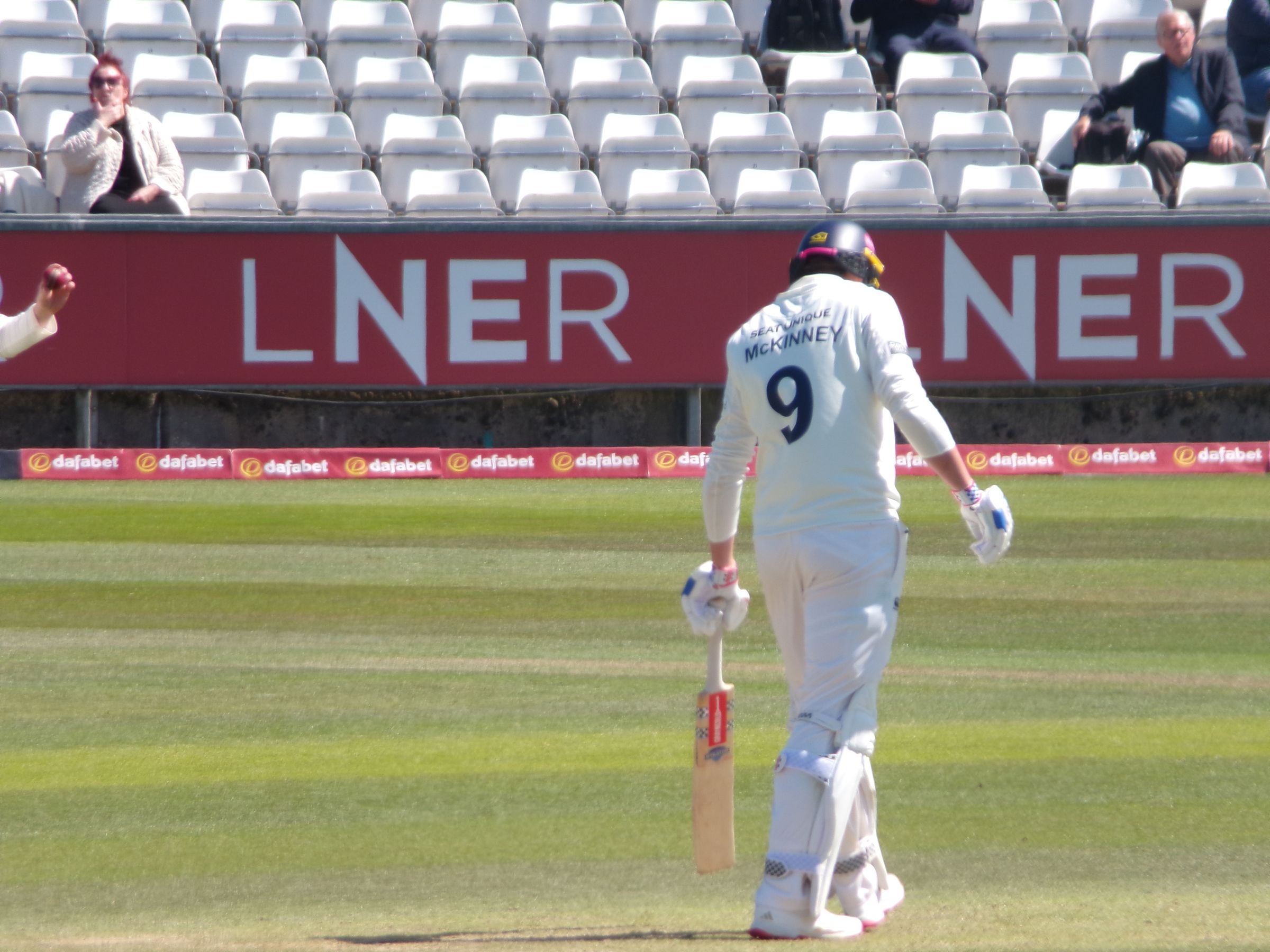 Ben McKinney taking his guard ahead of facing a delivery in a County Championship fixture at Banks Homes Riverside
