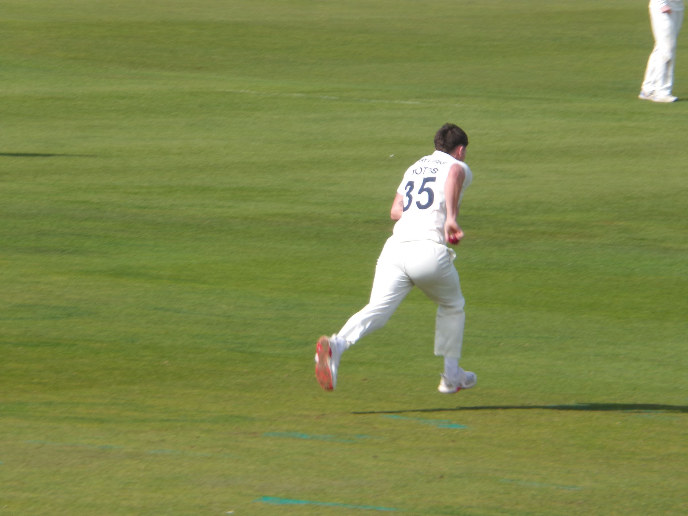 Matthew Potts bowling for Durham in the County Championship